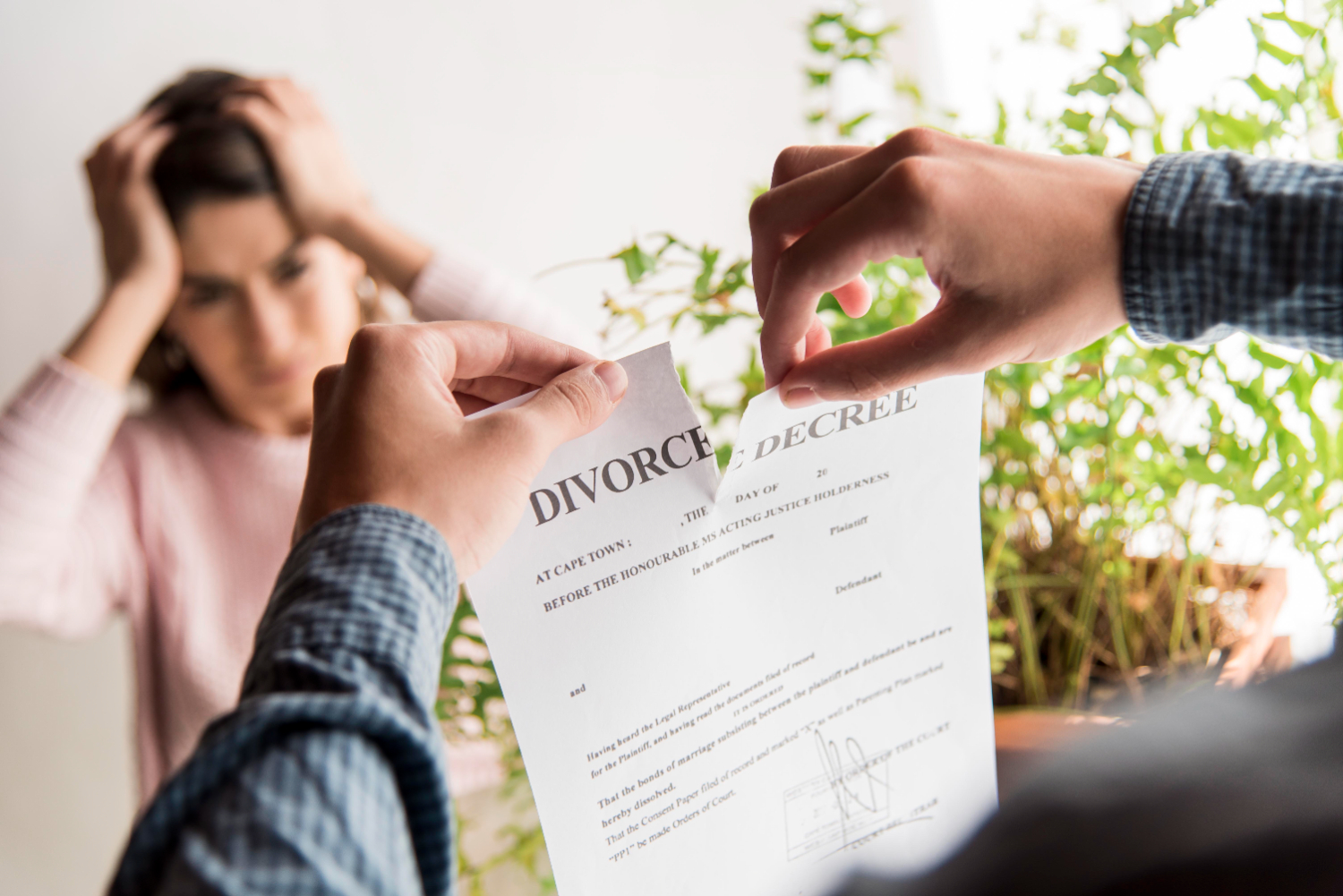 divorce paperwork being ripped