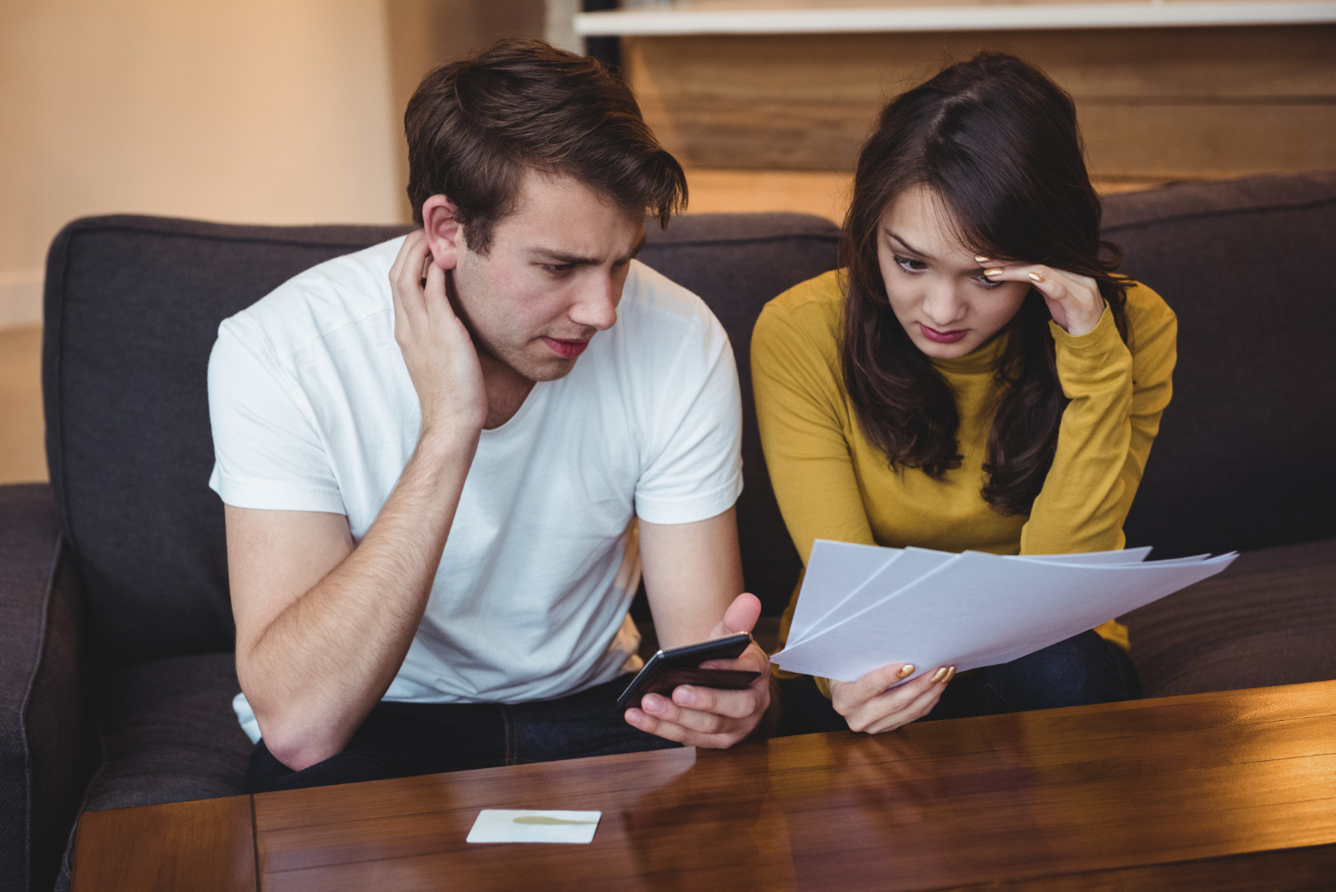 couple looking frustrated